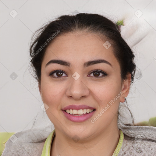 Joyful latino young-adult female with medium  brown hair and brown eyes