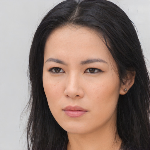 Neutral asian young-adult female with long  brown hair and brown eyes