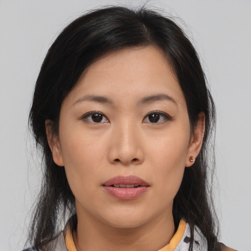 Neutral asian young-adult female with medium  brown hair and brown eyes