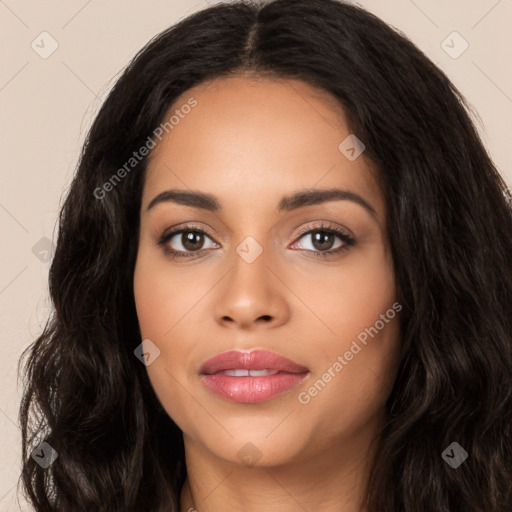 Joyful latino young-adult female with long  black hair and brown eyes