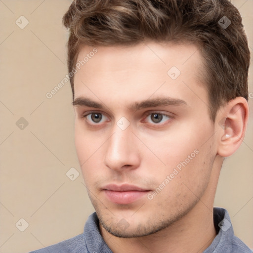 Neutral white young-adult male with short  brown hair and brown eyes