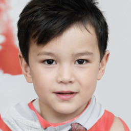 Joyful white child male with short  brown hair and brown eyes