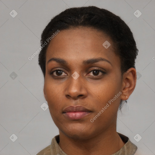 Neutral black young-adult female with short  brown hair and brown eyes