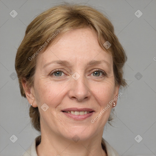 Joyful white adult female with medium  brown hair and grey eyes