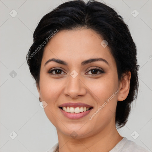 Joyful latino young-adult female with medium  brown hair and brown eyes