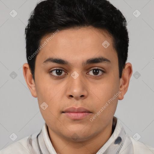 Neutral latino young-adult male with short  black hair and brown eyes