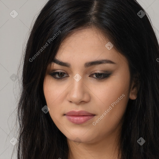 Joyful latino young-adult female with long  black hair and brown eyes