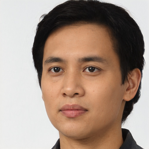 Neutral asian young-adult male with short  black hair and brown eyes