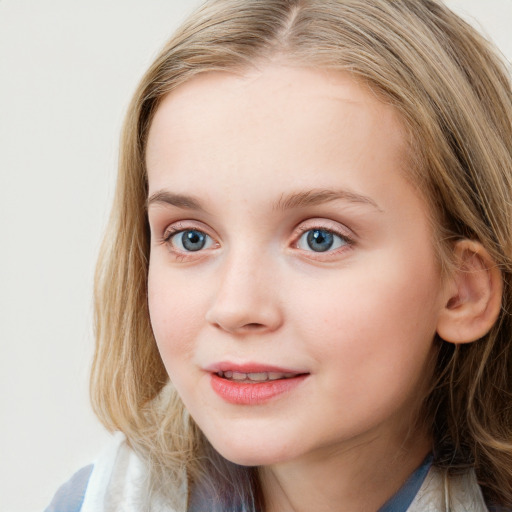 Joyful white child female with long  brown hair and blue eyes