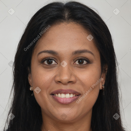 Joyful latino young-adult female with long  brown hair and brown eyes