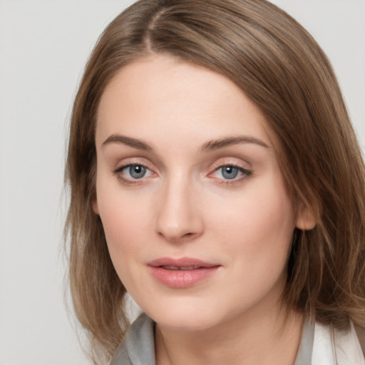 Neutral white young-adult female with medium  brown hair and grey eyes