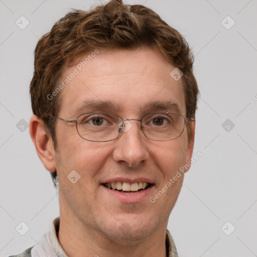 Joyful white adult male with short  brown hair and grey eyes