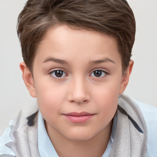 Joyful white child female with short  brown hair and brown eyes