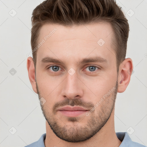 Neutral white young-adult male with short  brown hair and grey eyes