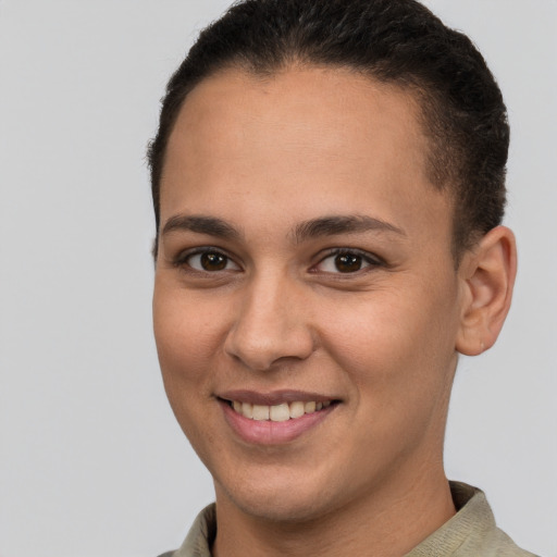 Joyful white young-adult female with short  brown hair and brown eyes