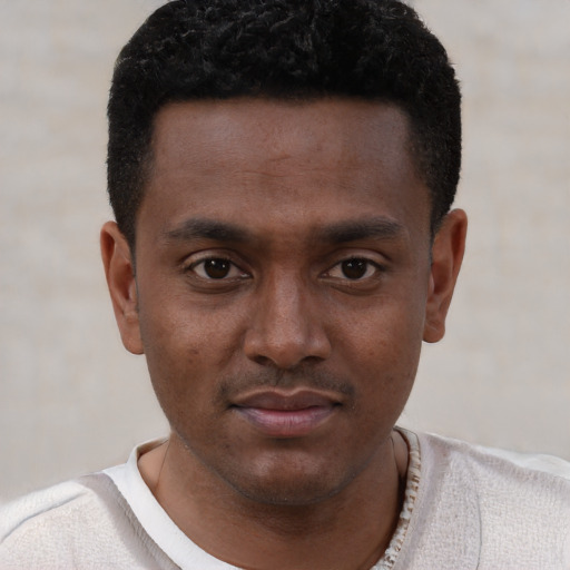 Neutral black young-adult male with short  brown hair and brown eyes