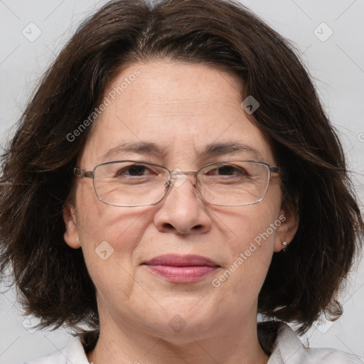 Joyful white middle-aged female with medium  brown hair and brown eyes