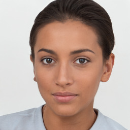 Neutral white young-adult female with short  brown hair and brown eyes