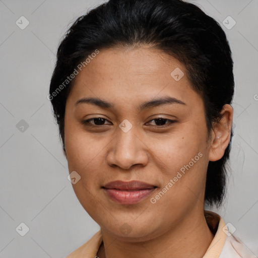 Joyful latino young-adult female with medium  brown hair and brown eyes