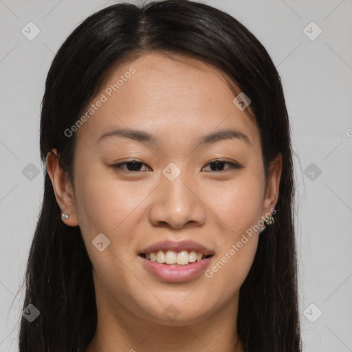 Joyful asian young-adult female with long  brown hair and brown eyes