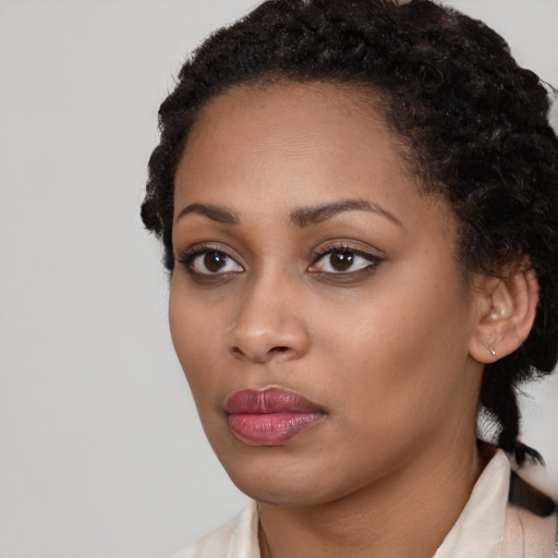 Neutral latino young-adult female with medium  black hair and brown eyes
