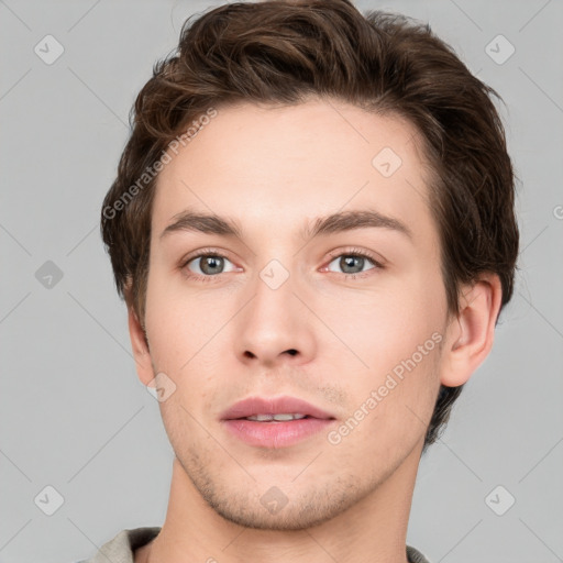 Neutral white young-adult male with short  brown hair and grey eyes