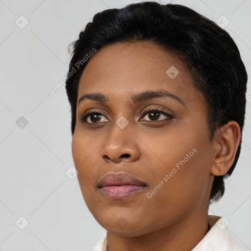 Neutral black young-adult female with short  black hair and brown eyes