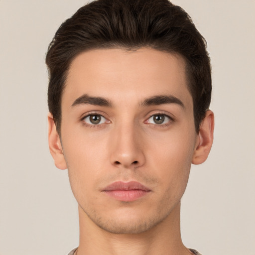 Neutral white young-adult male with short  brown hair and brown eyes