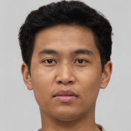 Neutral asian young-adult male with short  brown hair and brown eyes