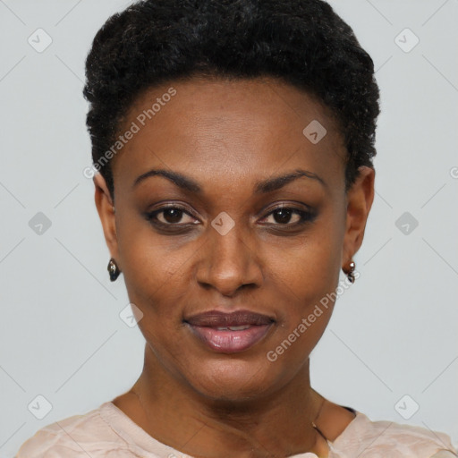 Joyful black young-adult female with short  black hair and brown eyes