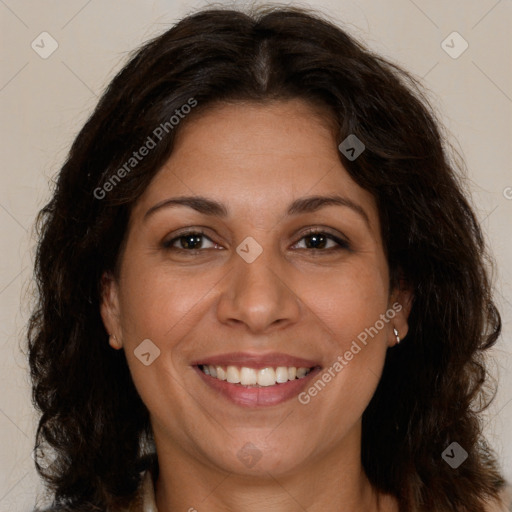 Joyful white adult female with long  brown hair and brown eyes