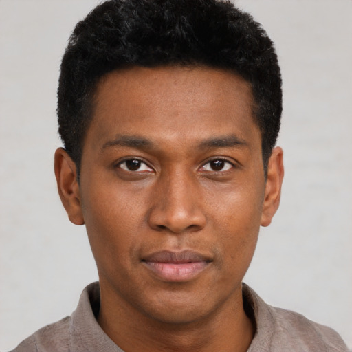 Neutral black young-adult male with short  brown hair and brown eyes