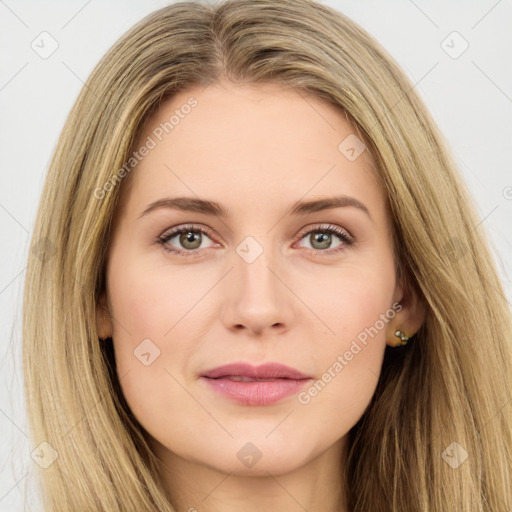 Joyful white young-adult female with long  brown hair and green eyes