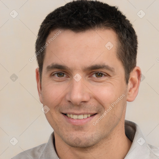 Joyful white young-adult male with short  brown hair and brown eyes