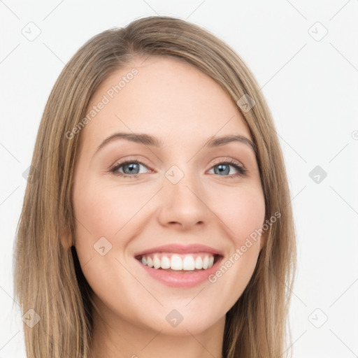 Joyful white young-adult female with long  brown hair and green eyes