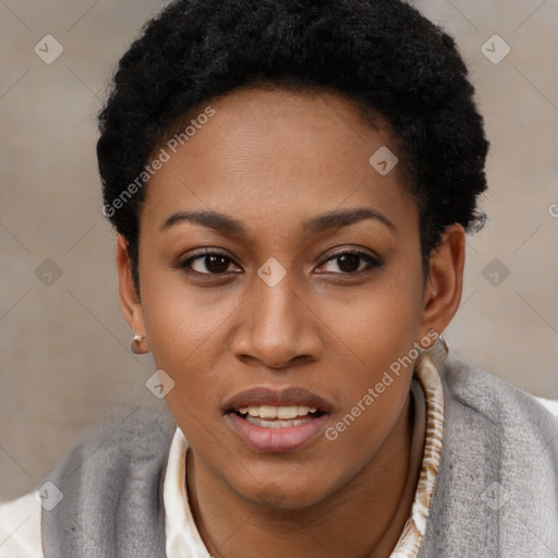 Joyful black young-adult female with short  black hair and brown eyes