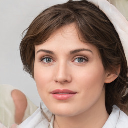 Neutral white young-adult female with medium  brown hair and brown eyes