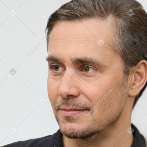 Neutral white adult male with short  brown hair and brown eyes