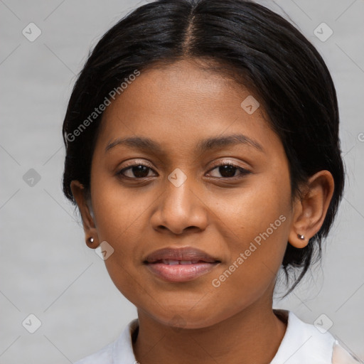 Joyful latino young-adult female with medium  black hair and brown eyes