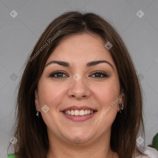 Joyful white young-adult female with medium  brown hair and green eyes