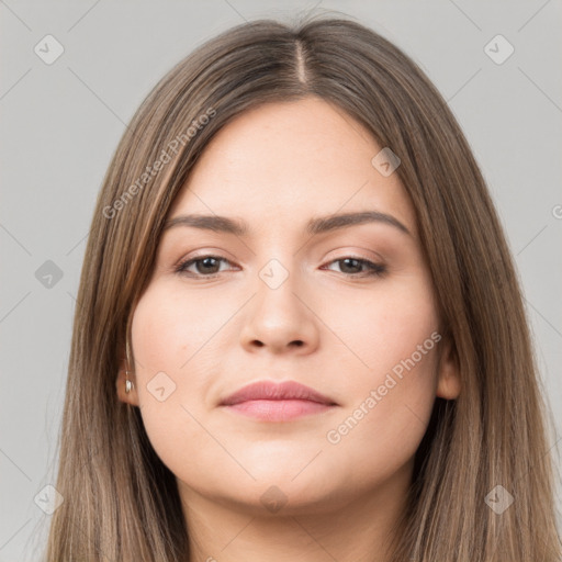 Neutral white young-adult female with long  brown hair and brown eyes