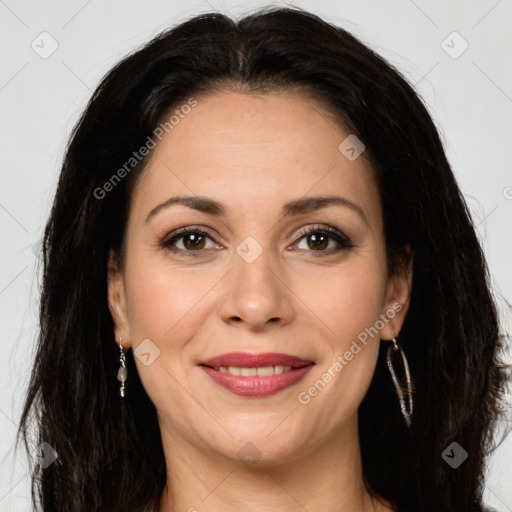 Joyful white adult female with long  brown hair and brown eyes