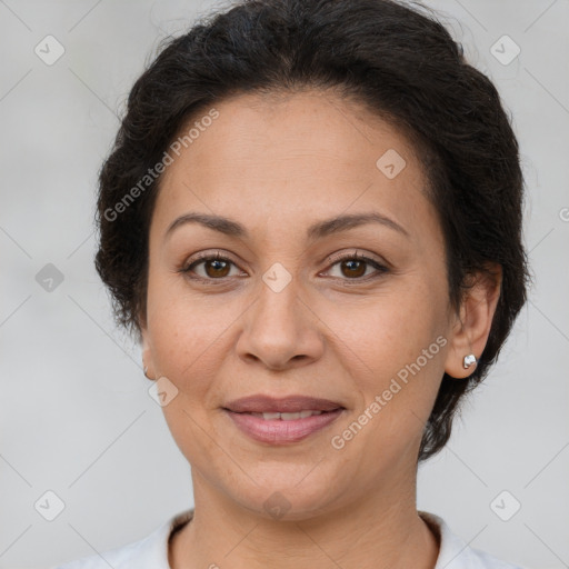 Joyful white adult female with short  brown hair and brown eyes