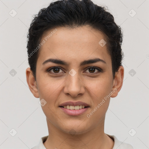 Joyful latino young-adult female with short  brown hair and brown eyes