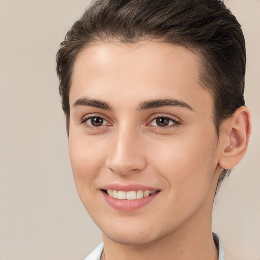 Joyful white young-adult female with short  brown hair and brown eyes