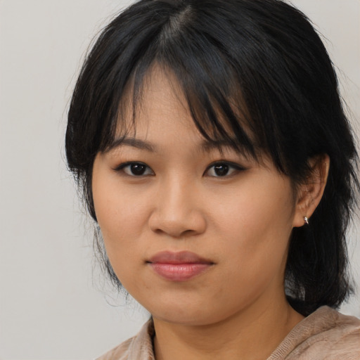Neutral asian young-adult female with medium  black hair and brown eyes