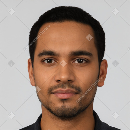 Neutral latino young-adult male with short  black hair and brown eyes