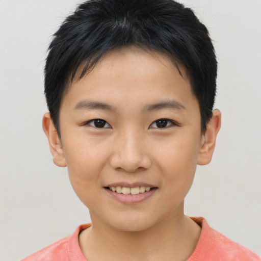 Joyful asian child female with short  brown hair and brown eyes