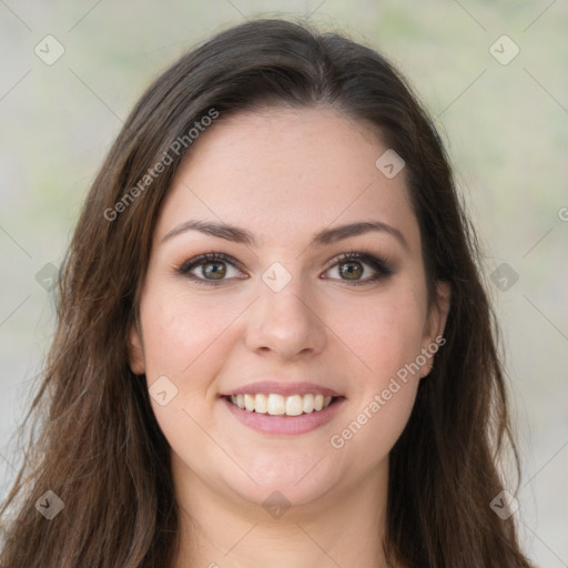 Joyful white young-adult female with long  brown hair and green eyes