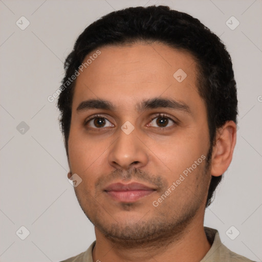 Neutral latino young-adult male with short  black hair and brown eyes